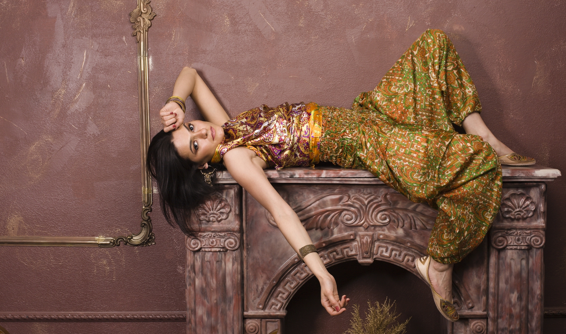 portrait of beauty sensual young woman in oriental style in luxury room